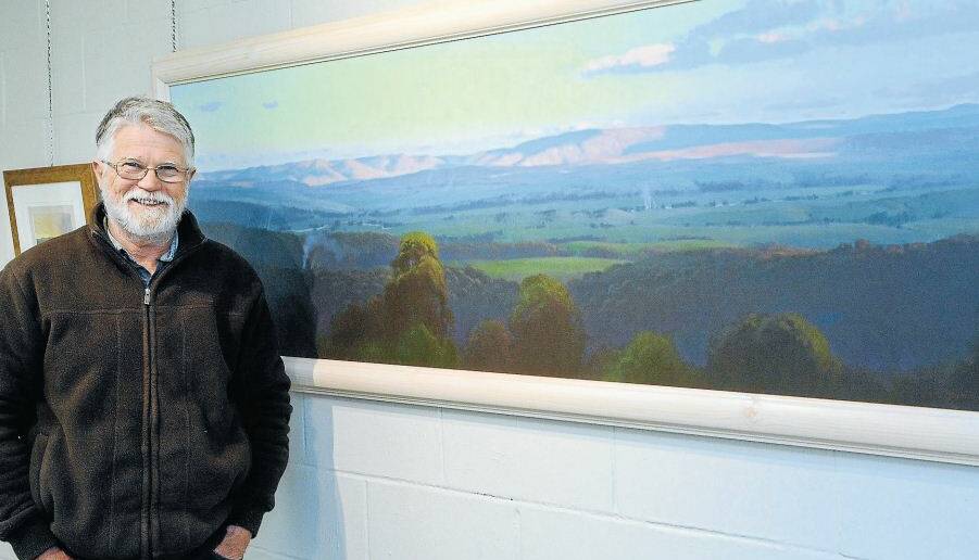 THROUGH AN ARTIST’S EYES: Rockley artist Tim Miller with one of his beautiful works from the Macquarie exhibition. Photo: PHILL MURRAY 091914ptim2