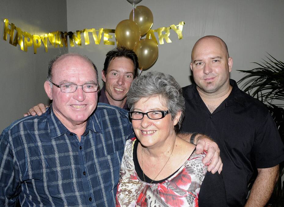 SNAPPED: Graham and Kay Clarke celebrate their 50th wedding anniversary with their sons Bradley and Cameron. Photo: CHRIS SEABROOK