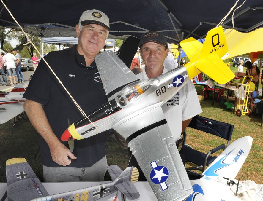 SNAPPED: The Scots School's annual Highland Gathering. Bathurst Model Aero Sports Inc. club members, Mike Connelly with Alain Lemoine next to a WW11 P51 Mustang. 032314cscots4