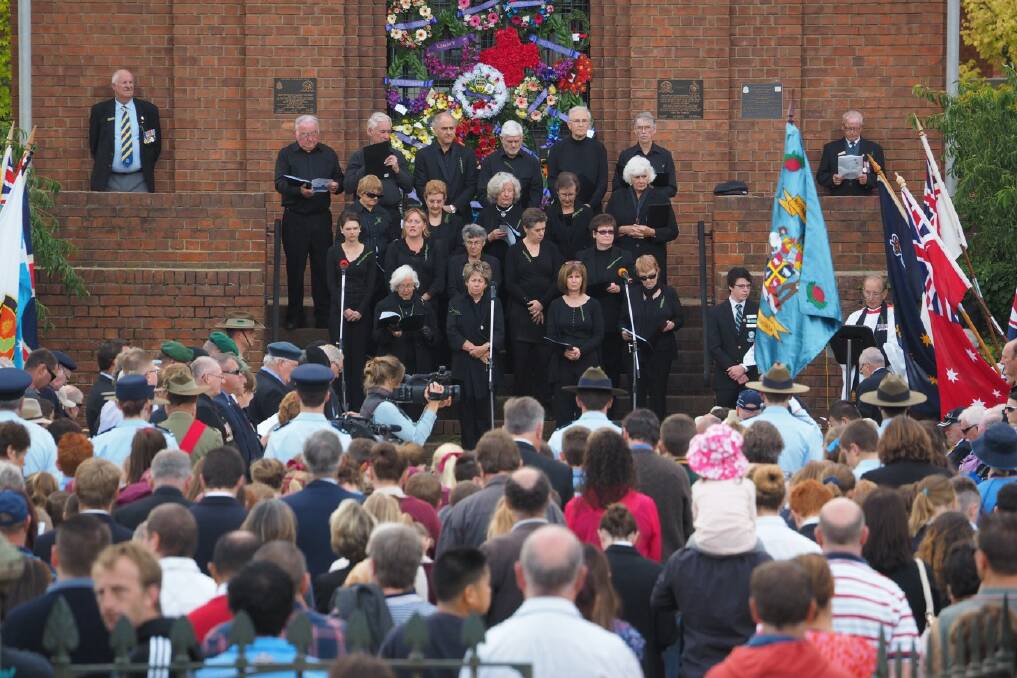 ANZAC DAY: The march wended its way through the large crowd lining Russell Street on Friday. Bathurst's main Anzac Day commemoration service was then held at the War Memorial Carillon in front of thousands of people who came to pay their respects. PHOTOS: Zenio Lapka. 
