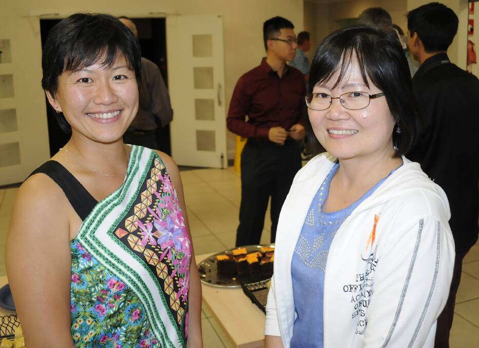 OUT AND ABOUT: Eevon Chia with Maria Liu celebrating Harmony Day. 