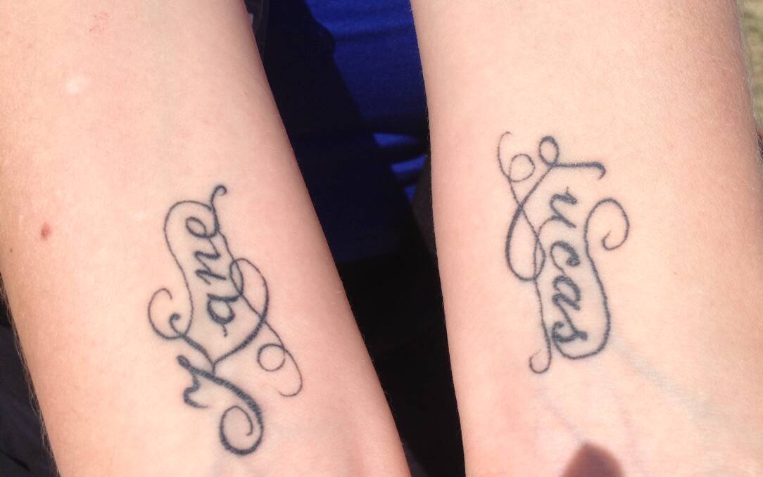 Tanya Bates from Melbourne got these wrist tattoos two months' ago featuring her children's names, Lucas and Kane.  Photo: JAMES LISLE