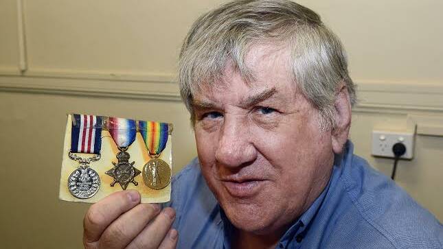 WANTED: Robin Levinson is looking to purchase war medals, old coins and banknotes, picuture postcards, antique jewellery and more, for use in private and public museums and collections. Photo: PHILL MURRAY  040814pmedals1