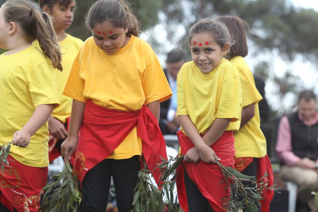 WELCOME: Wiradyuri children swept and danced during the ceremony to mark Bathurst's bicentenary. Phots: PHIL BLATCH 050715pbflag55