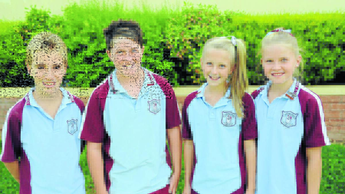 HOLY FAMILY SCHOOL: Benson Sharwood, Geordie Larkin, Ruby Clarke and Molly Brown.
021314holy3
