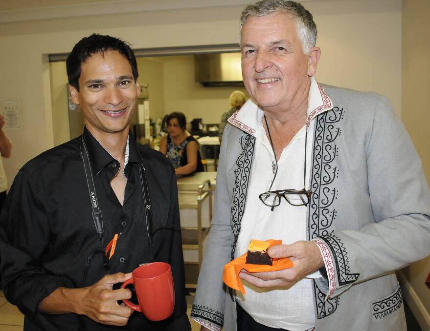 OUT AND ABOUT: Laurence Outim and Aivars Klavins celebrating Harmony Day. 