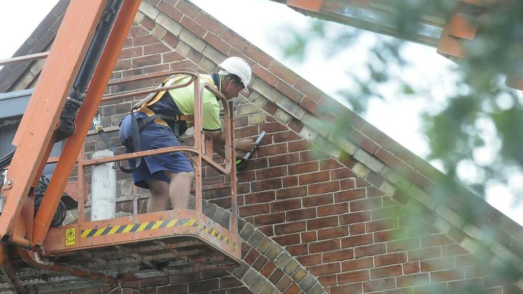 BATHURST: Steel beams are being installed to support the walls of St Barnabas’ Anglican Church, which was gutted in a blaze last month.