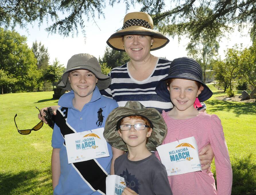 SNAPPED: The Melanoma March. Lisa Sargent with her kids,George, Gus and Poppy. Photos: CHRIS SEABROOK 032314cmel1