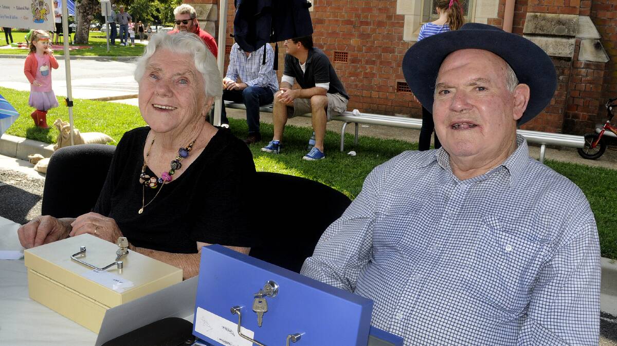 SNAPPED: St Michael and St John’s Cathedral community fete. Maureen MacCabe with Bob Alderman.