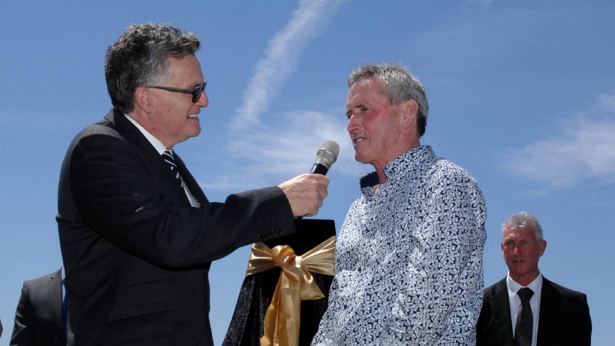 OFFICIALLY OPENED: Bathurst Paceway race caller Chris Gray with prolific trainer Steve Turnbull and Bathurst Harness Racing Club chief executive officer Danny Dwyer at the official opening of the new track yesterday. Photo: ZENIO LAPKA 	101914ztrots12