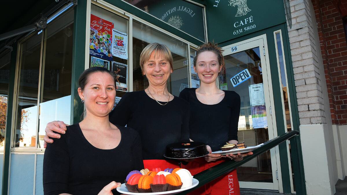 NATIONAL EXPOSURE: Hannah Legall, Angele Legall and Erin Salafia were thrilled to learn that Legall’s Patisserie and Café was mentioned in a national magazine article describing Bathurst as one of the country’s hottest foodie destinations. Photo: PHILL MURRAY	 080814plegall1