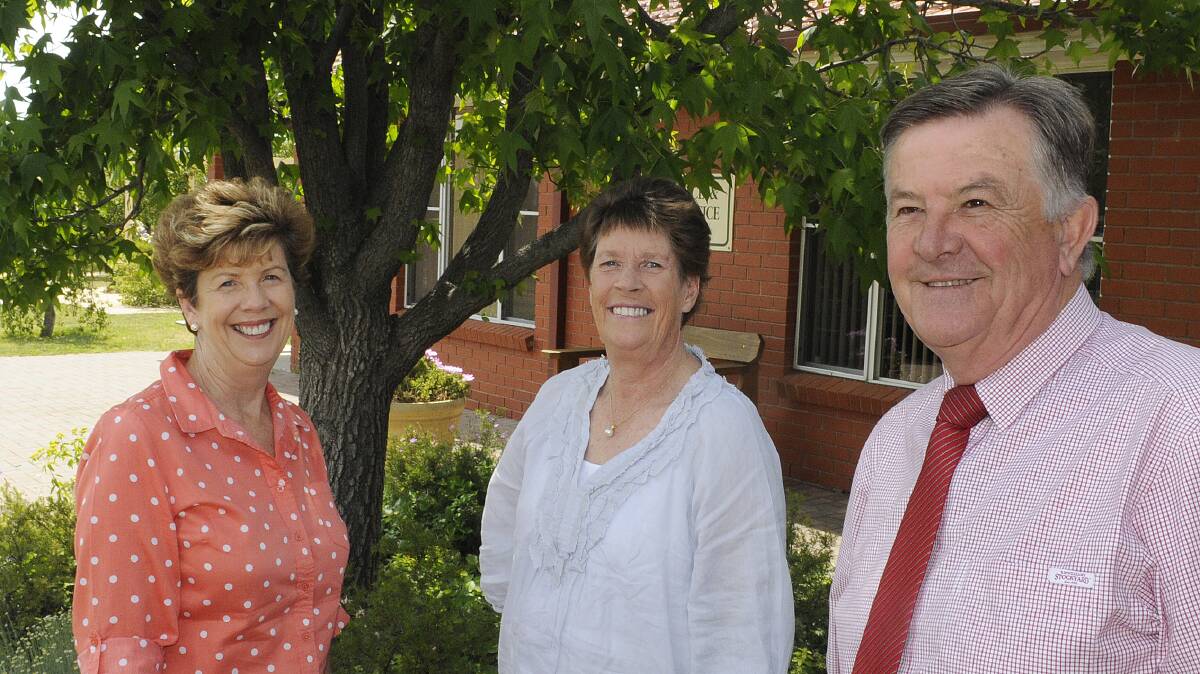 SIGNING OFF: Di Walkowiak, Therese Hooper and Peter Nugent from Assumption School will retire at the end of the year. Photo: CHRIS SEABROOK 	110514cassumptn