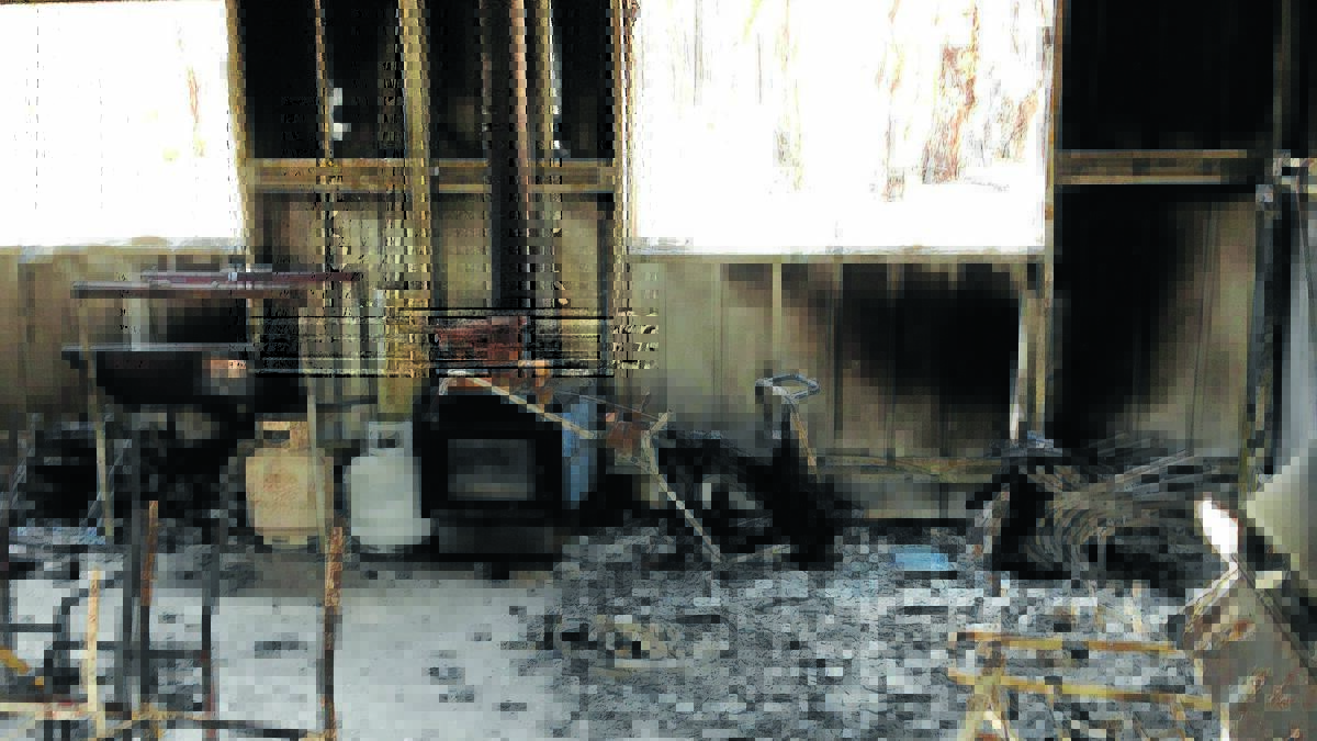 DAMAGE: The burnt out interior of the Wattle Flat Golf Club after January’s fire.