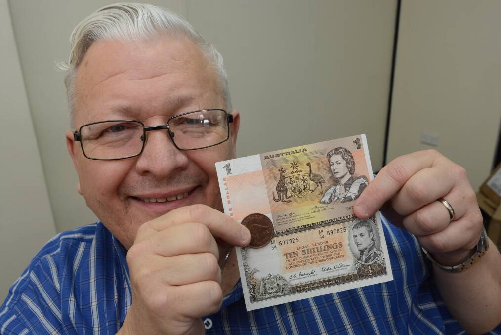 GOT A DOLLAR? As Australia prepares to mark decimal currency’s 50th anniversary, coin collector Alan McRae has dug up the first one dollar note, last penny and last 10 shilling note. Photo: PHILL MURRAY 021116palan