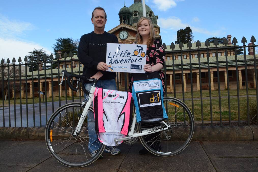 THE LONG RIDE: Rick Foster, pictured with his daughter Charlotte, will ride from Port Augusta to Bathurst to raise awareness of Crohn's disease. Photo: PHILL MURRAY	072514p[bikes