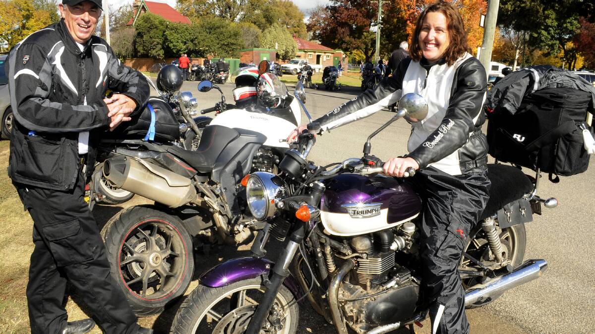 TEAM WORK: Bathurst mental health nurses and motorcycle enthusiasts, Amanda Forbes and Bob Davidson, completed a 4500km trip across Australia to get people talking about mental health issues. Photo: CHRIS SEABROOK	 051114cbikes2