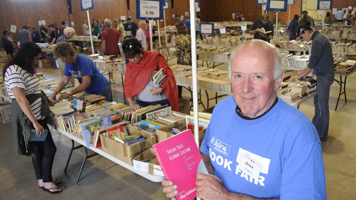 HELP IS THERE: Lifeline Central West chief executive officer Alex Ferguson said funds raised at the weekend’s Spring Book Fair will go to help those experiencing a crisis in their lives. Photo: CHRIS SEABROOK 	101914cbooks1