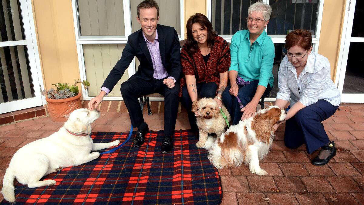 A LITTLE HELP FROM OUR FRIENDS: Dr Peter Fox with Yoshi, Noni Cole with Jasper, Linda Shreeve, and  Marita  Tipene with Max at the launch of Daffodil Cottage's new Pets as Therapy program yesterday. Photo: PHILL MURRAY 	043014ppets