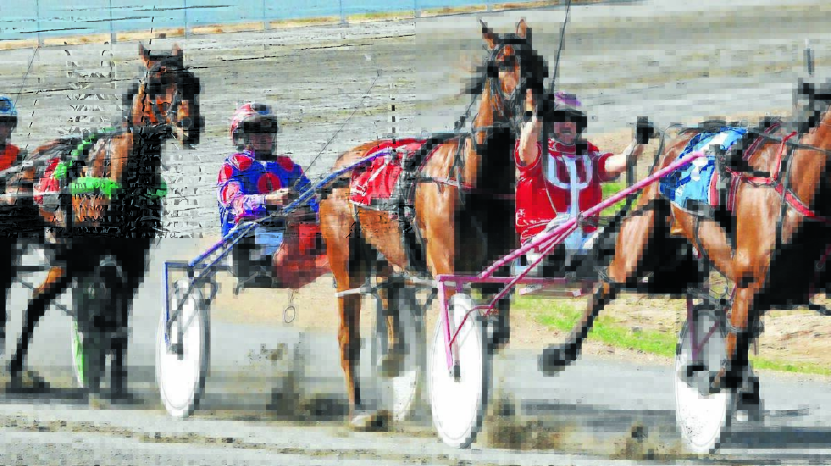 TOO STRONG: Lauren Panella on Rocky Carrington (right) holds off Bathurst’s Bernie Hewitt on board Trikala in yesterday’s Menangle Where Horses Fly Country Series Heat (1,730m). 