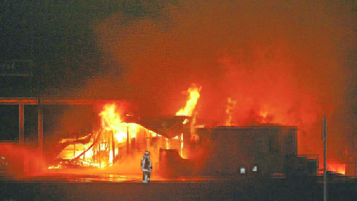 NOT GUILTY: The owner of a Mount Lambie service station destroyed by fire has vowed to rebuilt after being found not guilty of any criminal involvement in the blaze.
