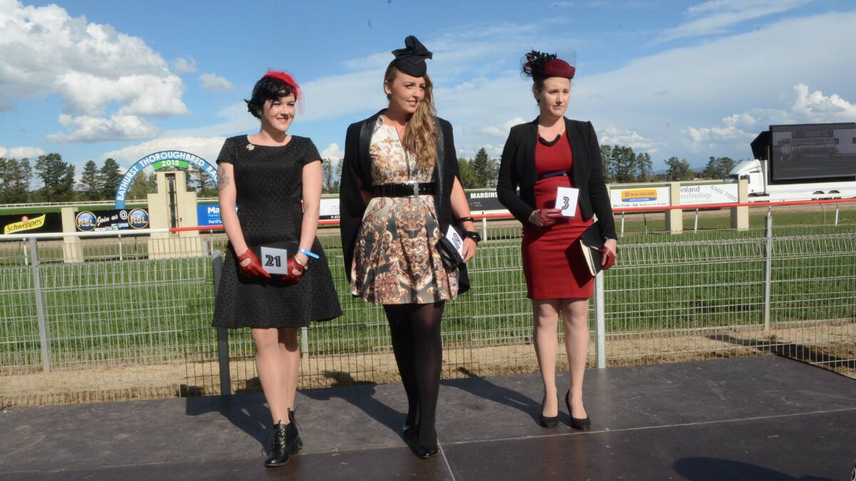 TRACKSIDE FASHION: Geordie Peacock, Sarah Barrott and Natalie Hart were the top three in the Under 30s category of the Soldier’s Saddle fashions on the field. Photo: PHILL MURRAY	 042515pfashions
