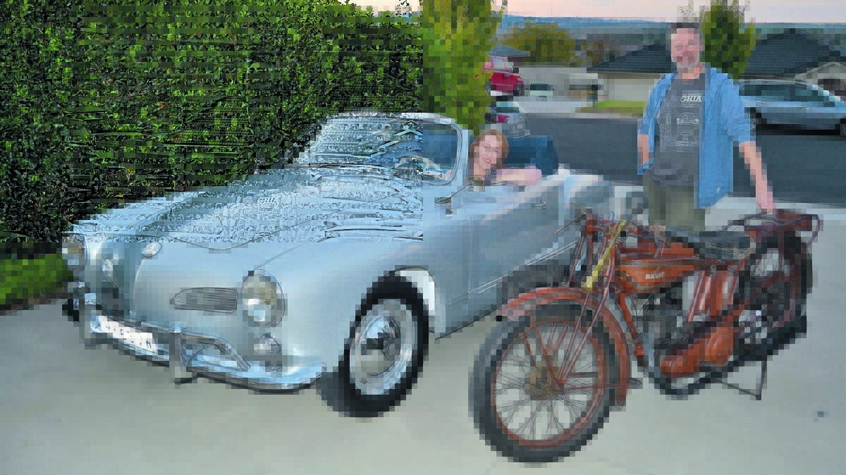 REV HEADS: Stephanie Robinson with her 1963 Volkswagen Karmann Ghia and her 
husband, Peter, with his 1926 Ravat motorbike. The duo will have their wheels on display at the upcoming Soar, Ride and Shine show. Photo: NADINE MORTON 	042216bike3