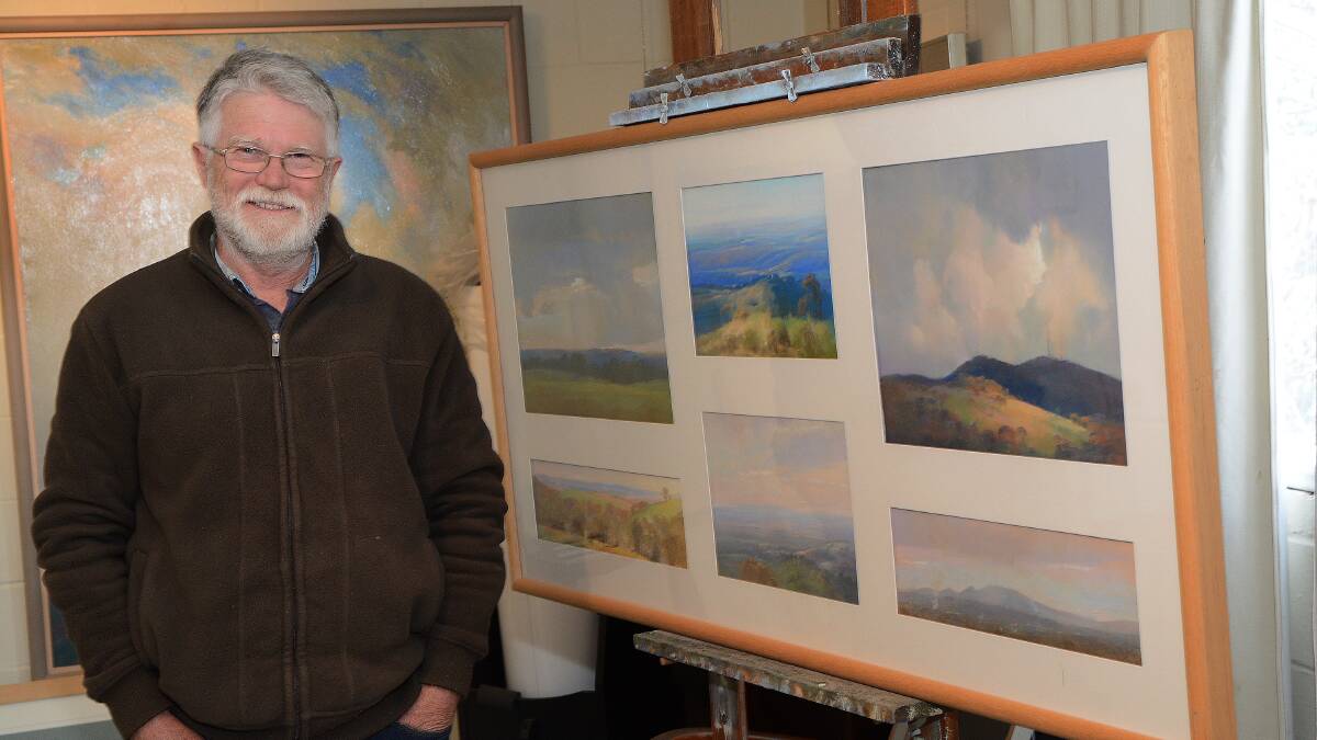 INTO THE WEST: Rockley artist Tim Miller with one of the landscape pieces he will exhibit in Journeys West. Photo: PHILL MURRAY 	091914ptim1
