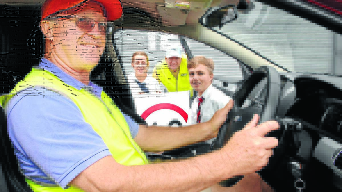 ROAD SAFETY: The Rotary Youth Driver Awareness Program will return to Mount Panorama this week. Pictured at last year’s event are driver Peter Hope, Gabby Elias, facilitator Matthew Irvine and Darcy Hogan.	030315zdrive