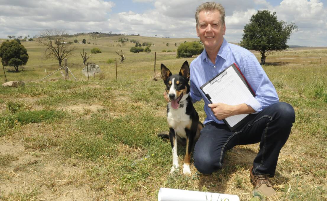 BATTLE READY: Dunkeld resident Brendan McHugh, pictured with his dog Charlie, says he will take Bathurst Regional Council to court after it twice rejected his proposed pet boarding kennel.