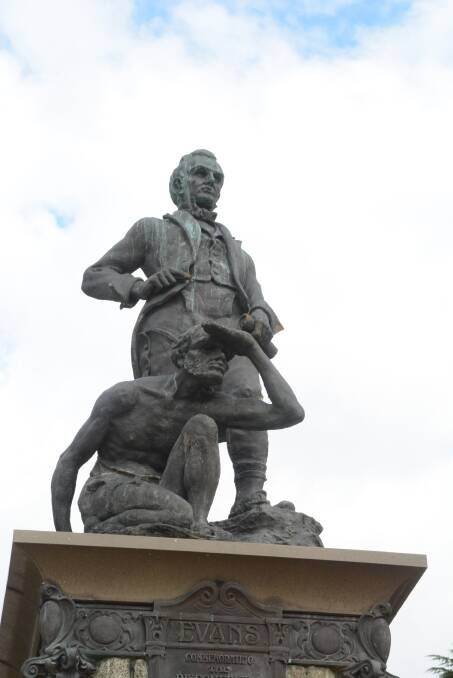 WRONG MESSAGE: The Evans Memorial in Kings Parade featuring a subservient Koori at the feet of the ‘great white man’. ‘I am offended by this statue and so are my people,’ says Wiradyrui elder Dinawan Dyirribang.
