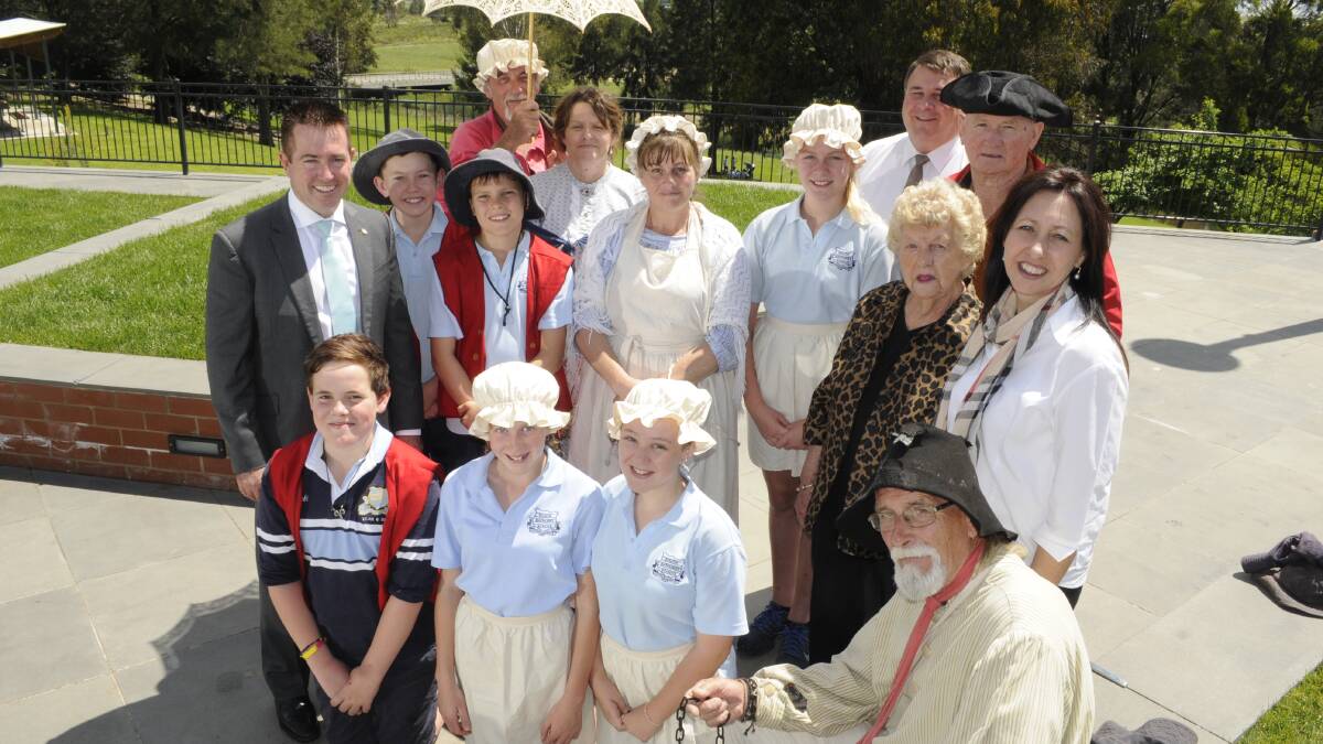 MAKING HISTORY FUN: Bathurst MP Paul Toole and Bathurst Goldfields’ owners Ruth Lennon and Debbie Campbell (far right) were joined by convicts, troopers and townsfolk, played by students from South Bathurst Public School, for the launch of their curriculum-based excursion program. Photo: CHRIS SEABROOK	 111615claunch