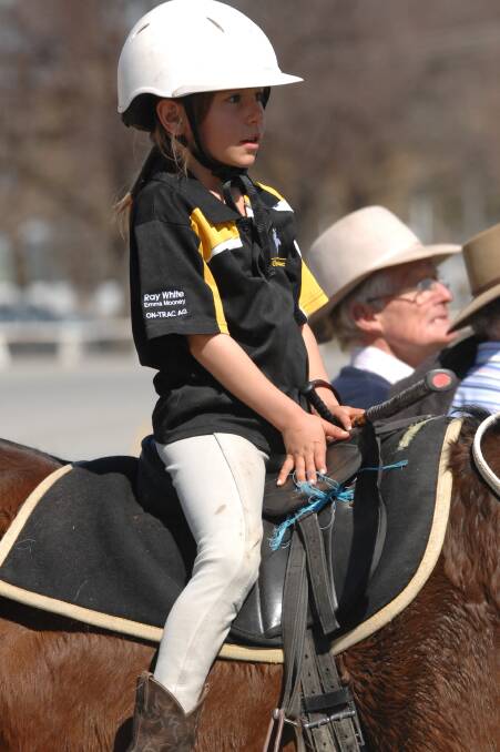 RIDING HIGH:  “You’ve got to move quick on your horse,” eight-year-old Pip Webb said. Photo: ZENIO LAPKA 	083114zpolox5