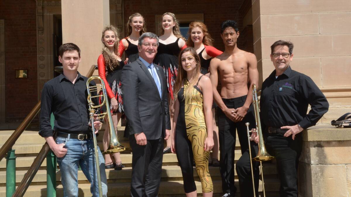 GALA BALL: (back) Oz Scot dancers Shennae Webster, Kaitlin Collins, Esther Dean and Neve Moore with (front) Mitchell Conservatorium’s Nic Cowans and (far right) Graham Sattler and (centre) Bathurst Regional Council mayor Gary Rush and Cirkus Surreal’s Zoi Petford and Uttam Rana-Magar are gearing up for the gala ball on October 9. Photo: PHILL MURRAY                  092415pball2