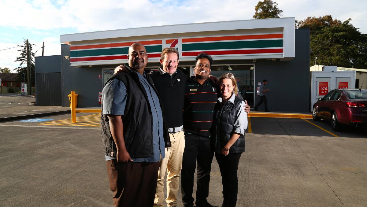 OPEN FOR BUSINESS: 7-Eleven franchisees Peter Nath, Paul Stevens, Kasi Viswanath and Tracey Stevens were all smiles yesterday as they opened their doors to the Bathurst region. Photo: PHILL BLATCH