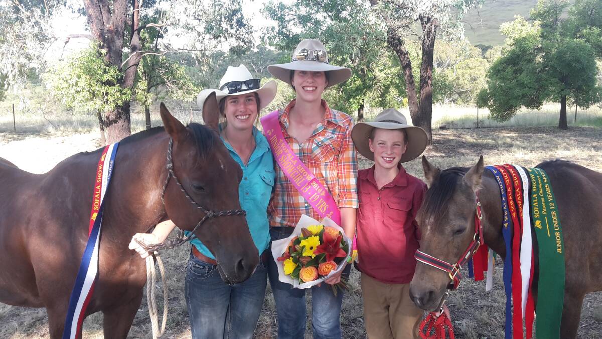 SLOW PROGRESS: Hayley Porter (left) with her sister Meghan and brother Thomas, along with horses Minnie (left) and Danni (right). 	031516hayley