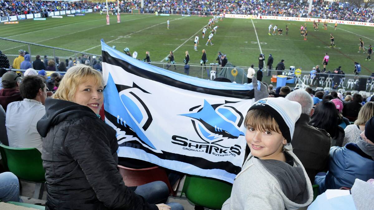 ON THE ROAD: Sharon Howard and her son, Bronson, 10, travelled from Port Macquarie to cheer the Cronulla Sharks to victory. Photo: CHRIS SEABROOK 	072614cnrl10