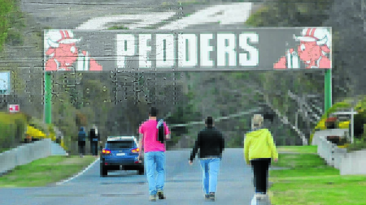 SAFETY FIRST: Walkers doing laps of Mount Panorama to keep fit have been warned to remain aware of cars. Photo: CHRIS SEABROOK 	 082014walker2