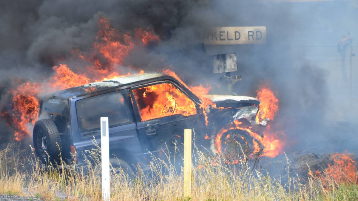 FIERY CRASH: A two-car collision started a grass fire at Dunkeld and blocked the Mitchell Highway for several hours on Thursday afternoon, but the two drivers escaped with 'non life-threatening' injuries.