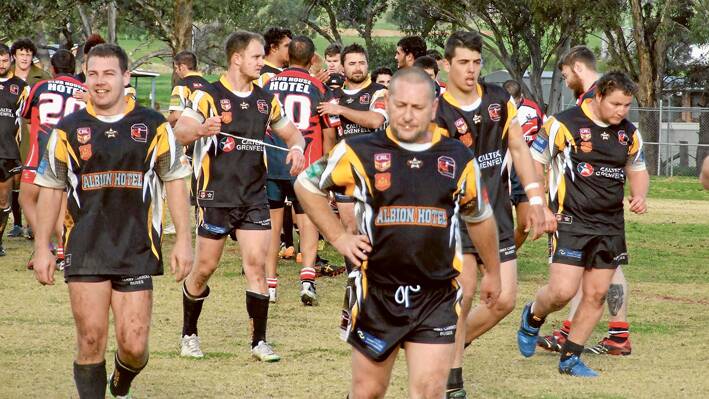 The Grenfell Goannas including Shannon Lee, Mick Stallard and Mick Miller, led by veteran Mark Horne leave the field of battle after a very hard win against a very good Peak Hill side last Sunday at Lawson Park in their Woodbridge Cup round. 