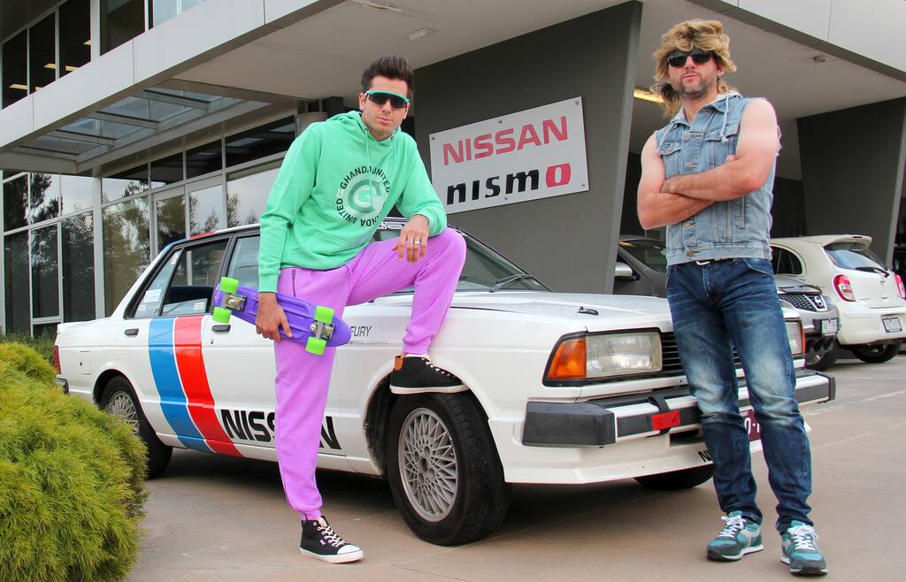 READY FOR BATHURST: Brothers Rick (left) and Todd Kelly will drive a Nissan Bluebird TRX to Bathurst ahead of Sunday’s Great Race and have sported suitable retro attire. 	100614kellybros