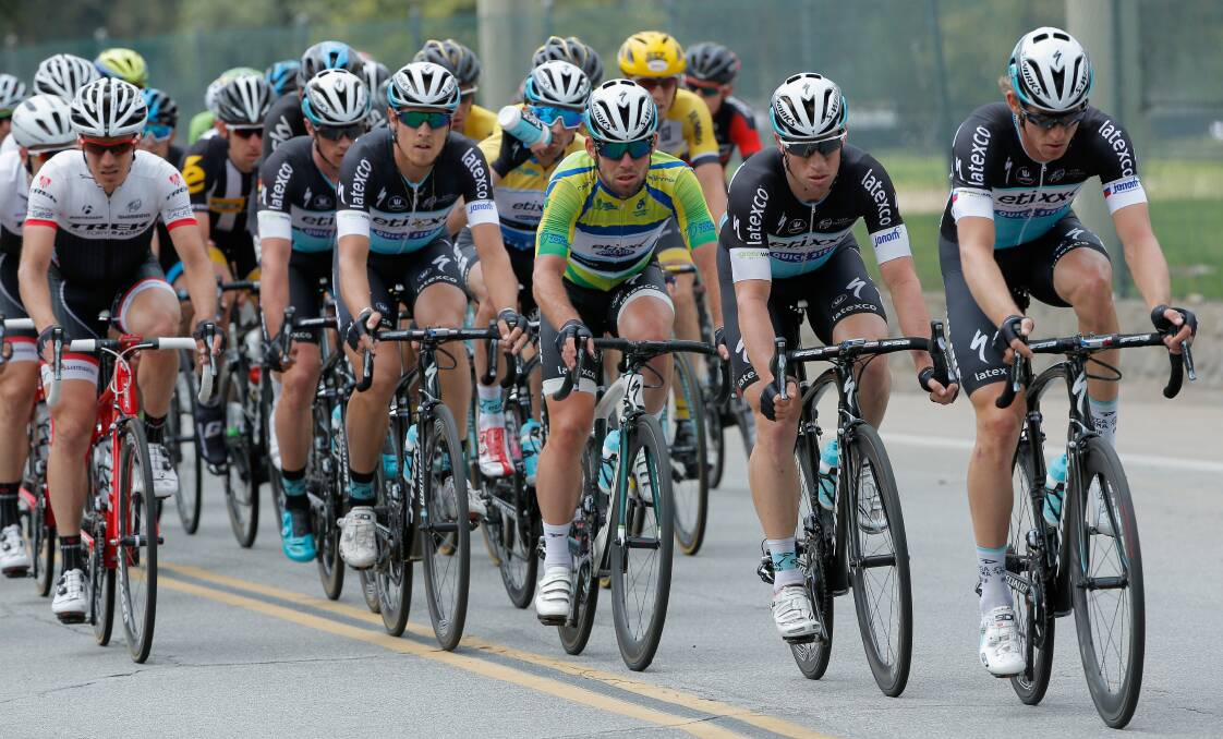 ON THE MARK: Bathurst cyclist Mark Renshaw (second from right) will be trying to help his QuickStep team-mate Mark Cavendish (third from right) improve on his 25 Tour de France stage wins when the 2015 edition of the cycling classic gets underway tomorrow. Photo: GETTY IMAGES 	051815renshaw