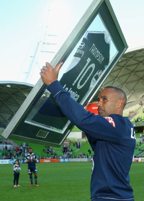 MILESTONE: Former Bathurst ’75 talent and now Melbourne Victory striker Archie Thompson was presented with a plaque after playing his 200th A-League game. Photo: GETTY IMAGES	 030215thompson