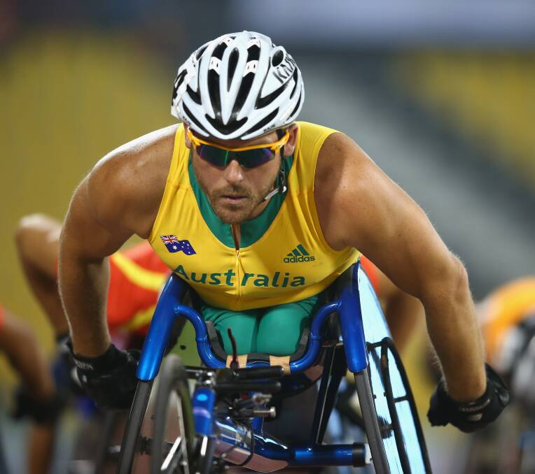 BUSY: Yesterday Kurt Fearnley placed fourth in the 5,000 metres final at the IPC Athletics World Championships in Doha, while this Sunday he will be pushing for his sixth New York Marathon crown. Photo: GETTY IMAGES 	102715kurt