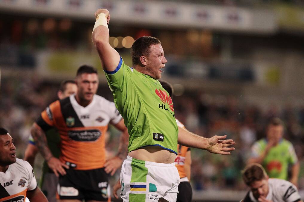MILESTONE: Cowra native and Canberra Raiders prop Shannon Boyd, pictured celebrating a try in last Saturday’s 60-6 win over Wests Tigers, will play his 50th NRL match tomorrow at Carrington Park. Photo: GETTY IMAGES	 042816boyd