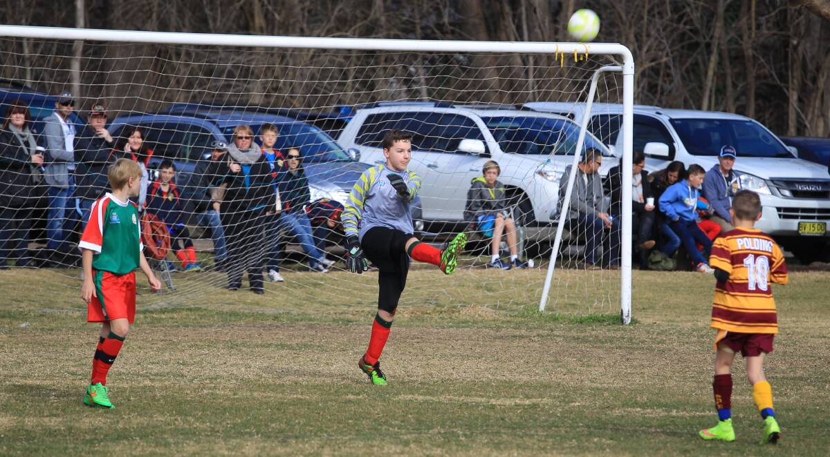 SAFE HANDS: Bathurst goalkeeper Ryan Duffy was in great touch for Western over the week’s play at the NSW PSSA Boys’ Football carnival at Proctor Park. He played a big part in helping his team to a 2-1 win over Polding yesterday. Photo: PHIL BLATCH 	062515pbsoccer1