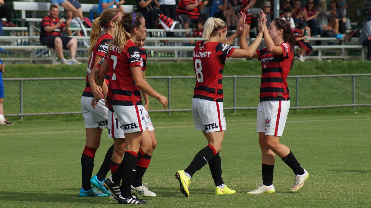 YOU BEAUTY: Bathurst soccer talent Erica Halloway (#8), who now plays for Western Sydney Wanderers, celebrates scoring a cracking goal in the club’s final game of the year. Photo: GRANT JACOBS	 011816halloway