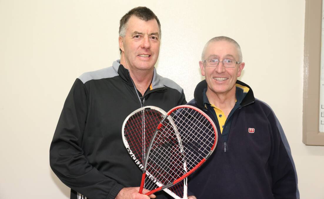 CLUB PRIDE: Dave Fuller (left) will be out to find success with the Bathurst Panthers Squash Club in the cross-town competition this weekend. Fuller’s two-decade long winning streak in the veterans division in the Bathurst Club Championships was ended recently by Andrew Kelly (right), so he will be hungry for a win. Photo: WIL LESH 	052015fullerkelly