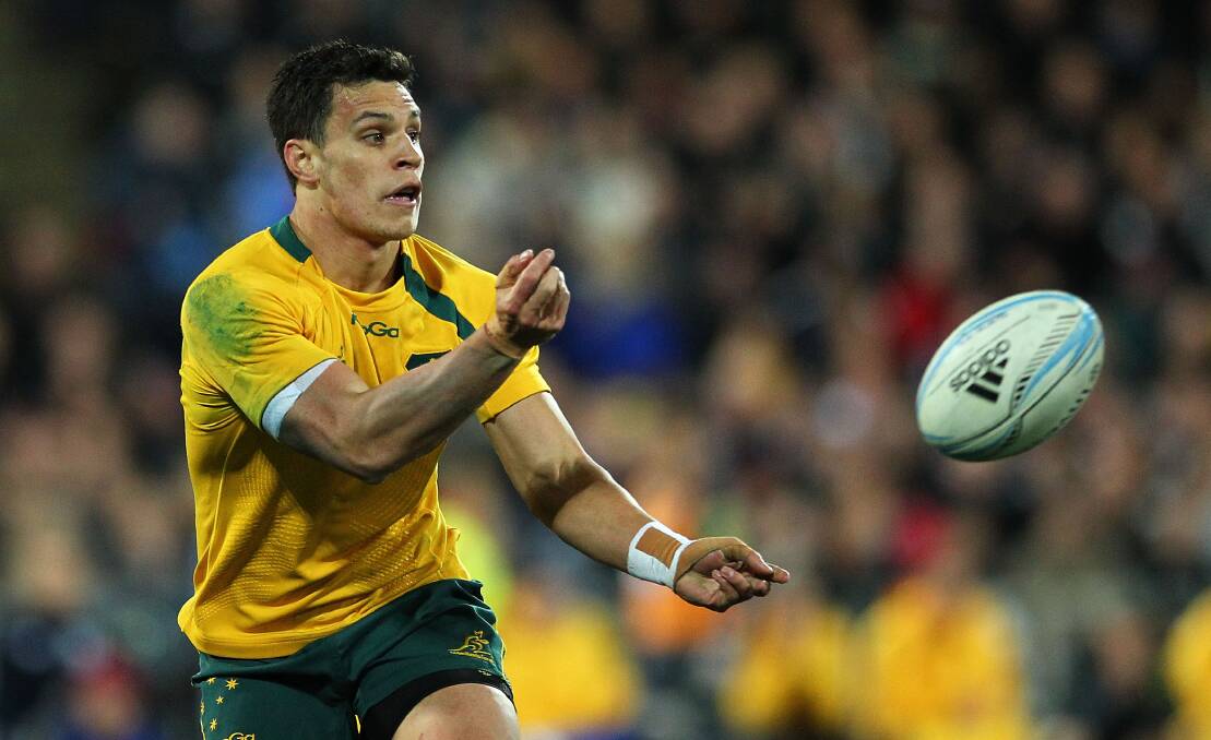 DRUMMING UP SUPPORT: Wallabies centre Matt Toomua hopes some of those fans who watch him train this afternoon will also support the Wallabies at ANZ Stadium in their Bledisloe Cup opener. Photo: GETTY IMAGES 	080614toomua