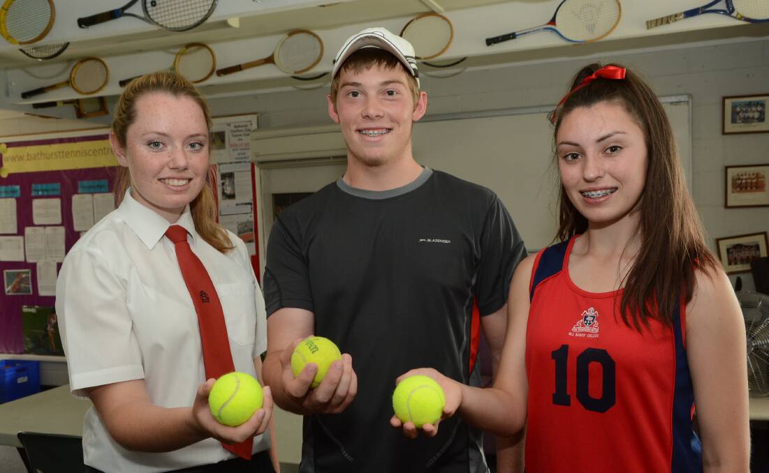 SYDNEY BOUND: Gabby Mitton, Sebastian Seaman and Dominique Mitton are off to the Sydney International next year where they will be on ball kid duty. Photo: PHILL MURRAY	 112014ptennis