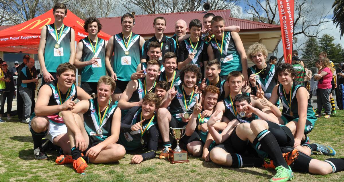 YOU BEAUTY: The Bathurst Bushrangers under 18s side made it back-to-back Central West AFL premiership flags by defeating minor premiers Orange Tigers in Saturday’s grand final. Photo: NICK McGRATH	 0913nm18s2